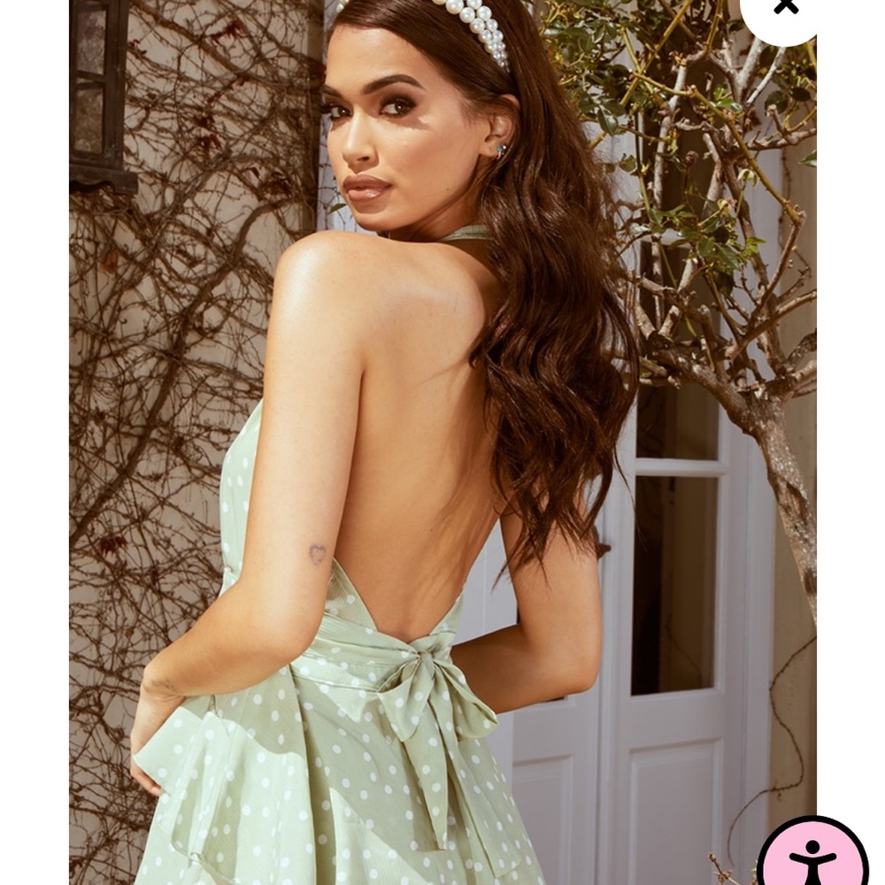 Pretty little thing green polka dot romper